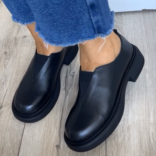 Women's black leather loafers